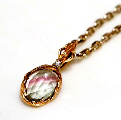 Chain Agete charm featuring topaz and diamond stones set in K10 gold with tourmaline, size 0.8 cm x 0.6 cm