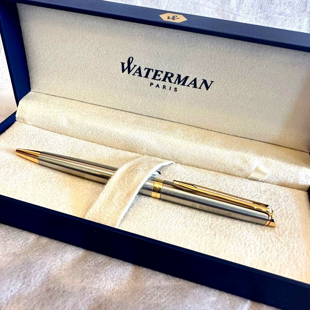 Waterman Ballpoint Pen with sleek black body and silver accents, measuring 14 cm long