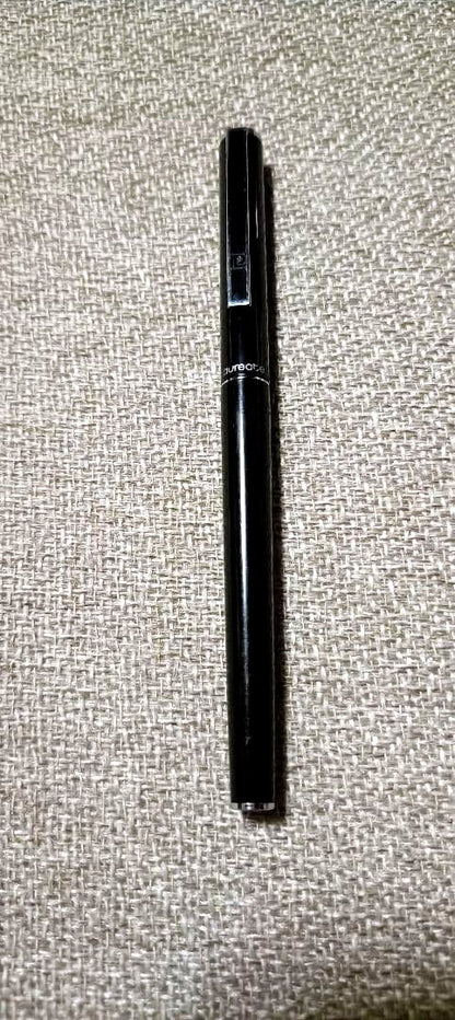 Pilot Laureate black and silver water-based ballpoint pen with cap on, showing light scratches and good condition