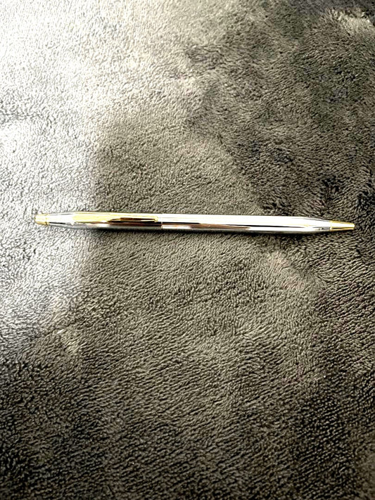 Silver CROSS metal ballpoint pen with clear body and sleek design