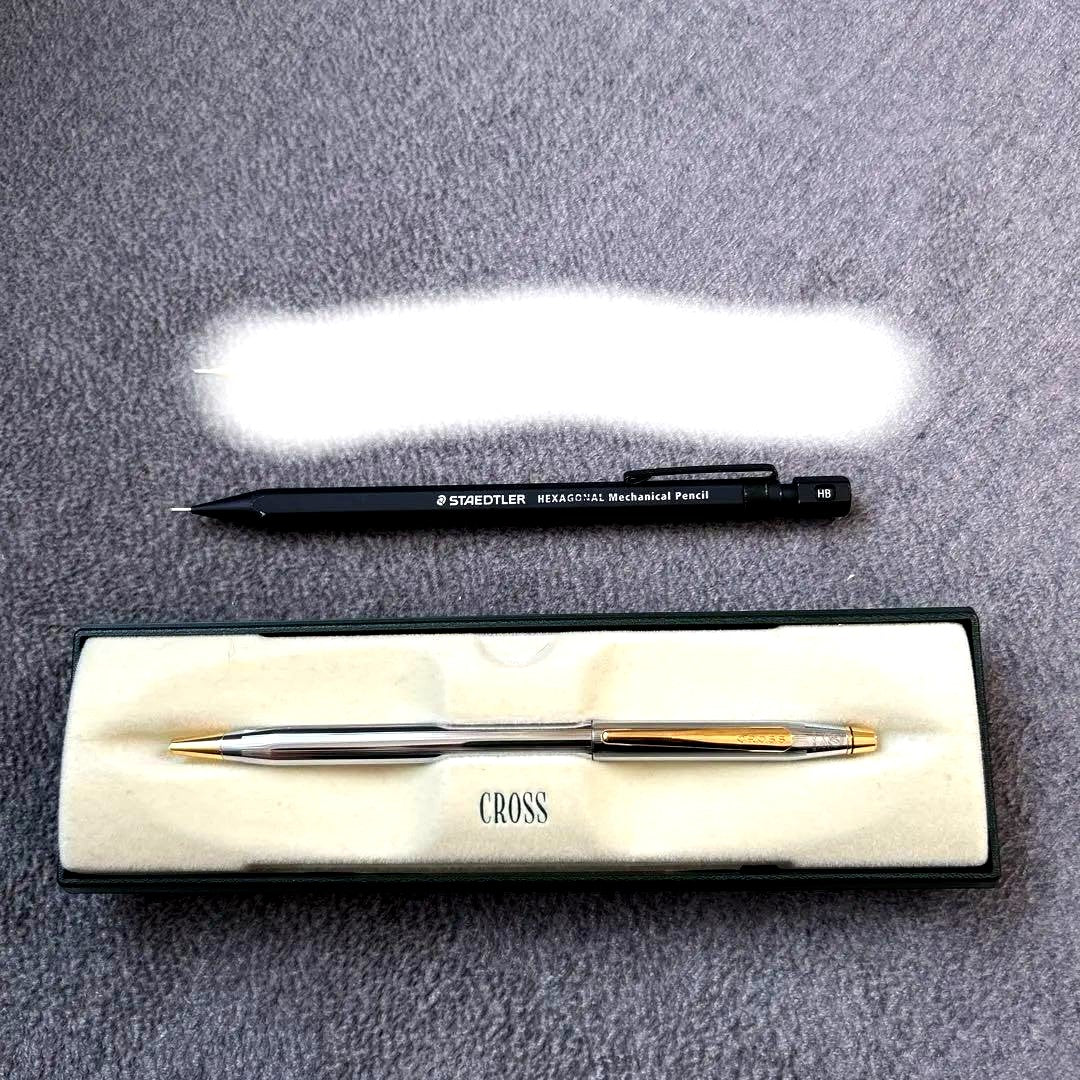 Black metal CROSS hexagonal mechanical pencil showing minor wear and scratches, Japan import model
