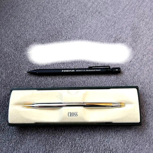 Black metal CROSS hexagonal mechanical pencil showing minor wear and scratches, Japan import model