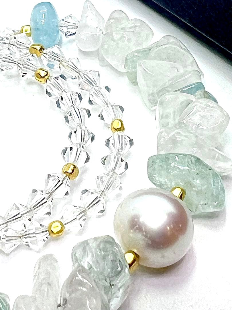 Large 10mm round untone Akoya pearl necklace with aquamarine stones and crystal chain