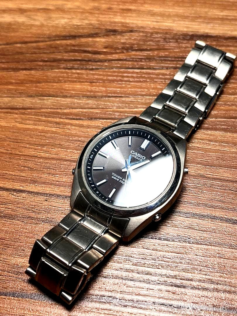 Casio Lineage LIW-130T titanium radio solar watch with metal band and digital-analog display