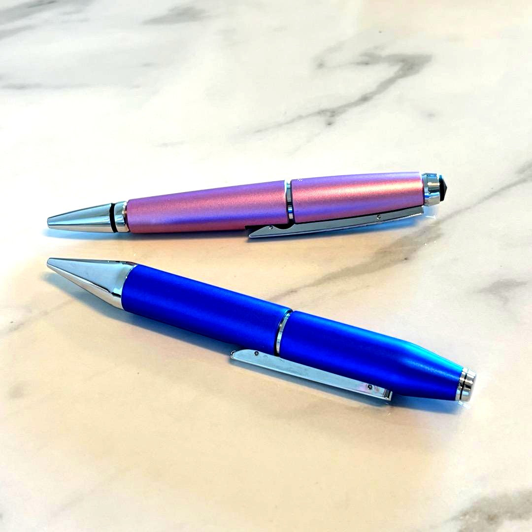 Cross ballpoint pen set showing two pens in blue and pink colors on white background