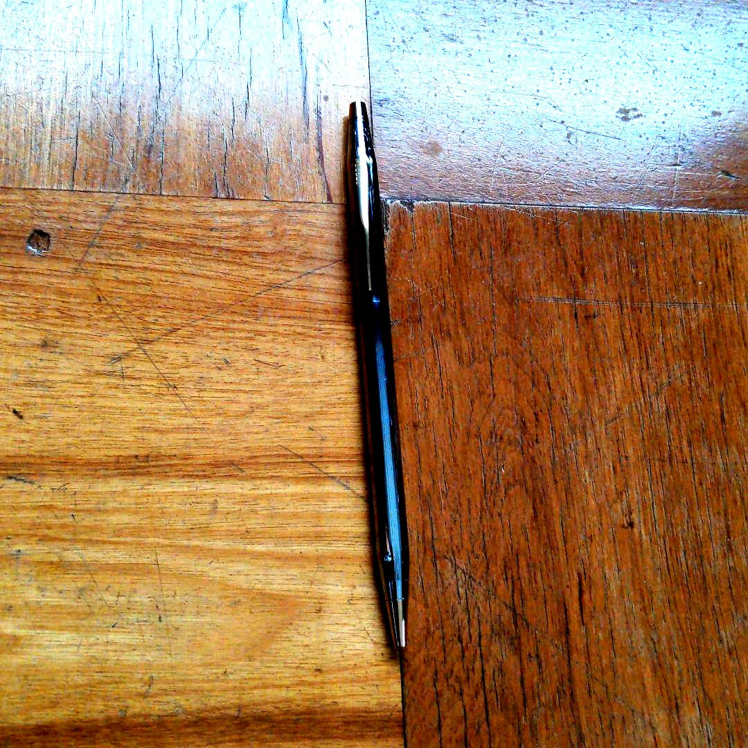 Cross Century silver and gold ballpoint pen made in the United States with metal body and oil-based ink