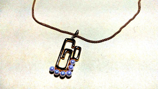 Mikimoto pearl necklace with gold and silver chain and 25mm by 15mm pearl pendant