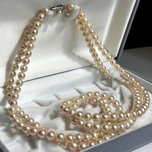 Two-strand Akoya pearl necklace with 7mm pearls, 59cm length, and sterling silver fittings