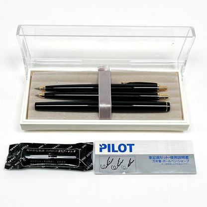 Pilot pen writing instrument set including fountain pen, ballpoint pen, and mechanical pencil with slight scratches