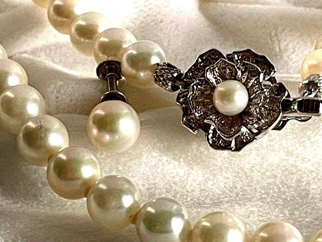 Akoya pearl necklace with 6.5-7mm pearls and matching 7mm pearl earrings set in K14 white gold