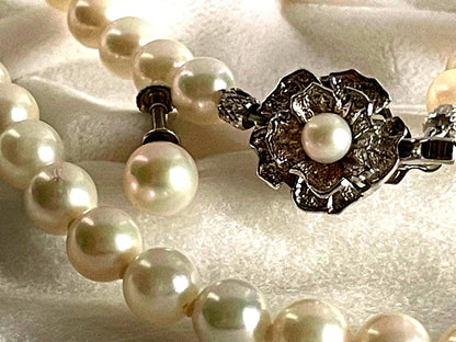 Akoya pearl necklace with 6.5-7mm pearls and matching 7mm pearl earrings set in K14 white gold