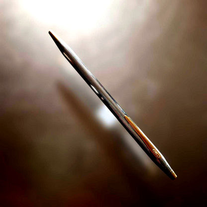 Cross Classic Century Medalist ballpoint pen with two black slim refills on white background