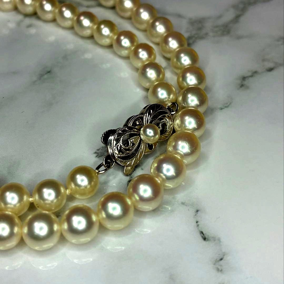 Mikimoto Akoya pearl necklace with 14k clasp featuring 6.0-6.5mm pearls and 44.5cm total length