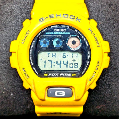 Casio G-Shock DW-6900H-9 Fox Fire collaboration watch with red and black design showing minor crack