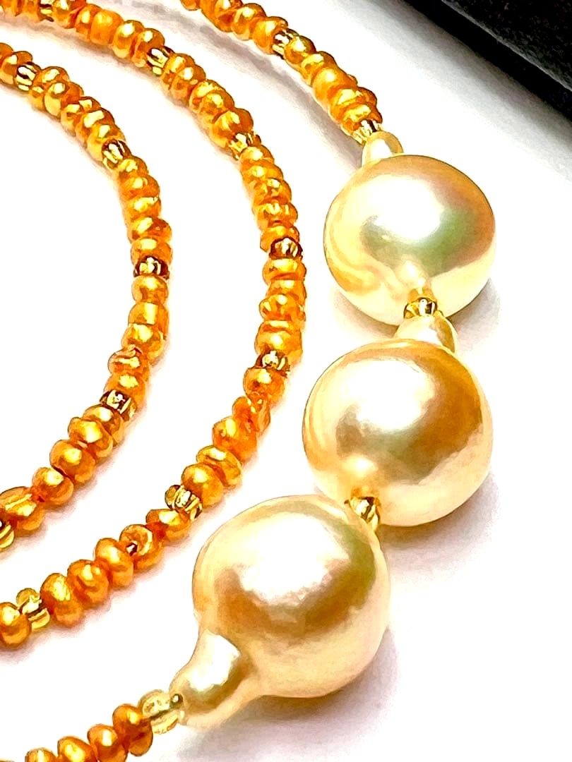 Gold Akoya pearl necklace with gold beads and baroque-shaped freshwater pearls on gold chain
