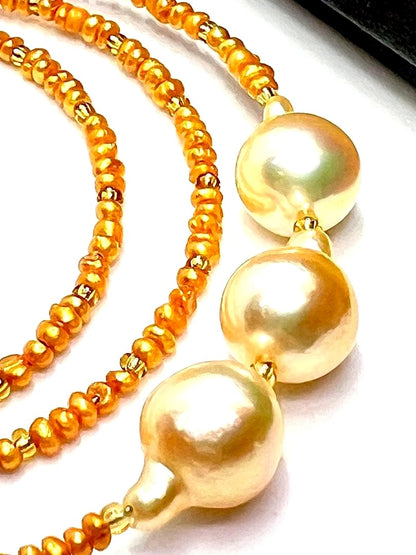 Gold Akoya pearl necklace with gold beads and baroque-shaped freshwater pearls on gold chain