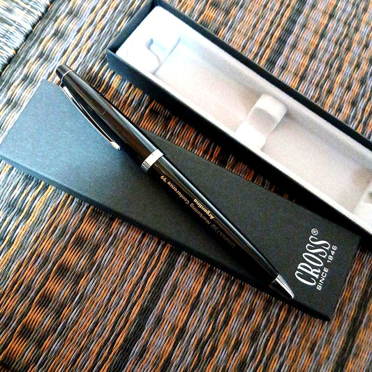 Crosso black ballpoint pen with logo on the body, displayed in its original box