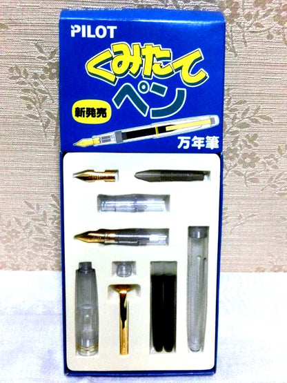 Pilot Kumitate fountain pen set in clear color with visible discoloration, scratches, and cracks