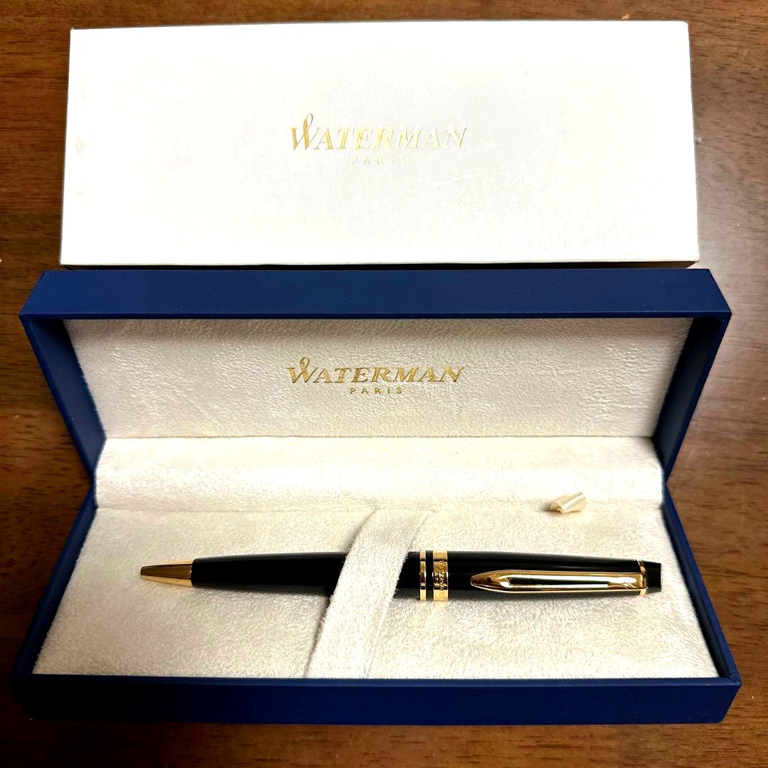 Waterman black ballpoint pen with metal body and dedicated case on white background
