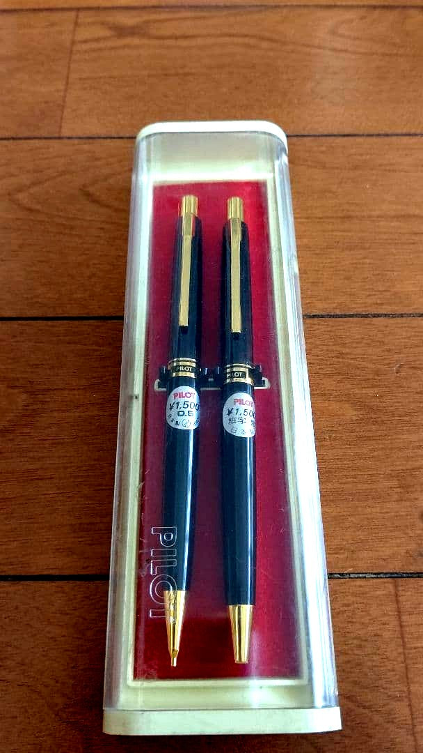 Pilot mechanical pencil and ballpoint pen set in a dedicated case showing pencil and pen with black ink