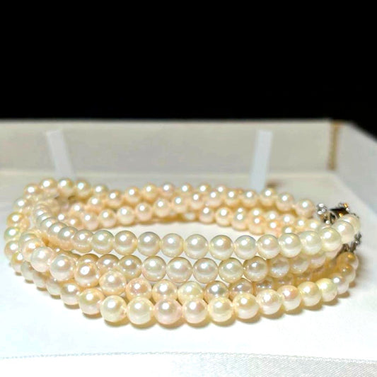 Two-strand Akoya pearl necklace featuring baby pearls sized 5.0-5.4mm, 41 cm length
