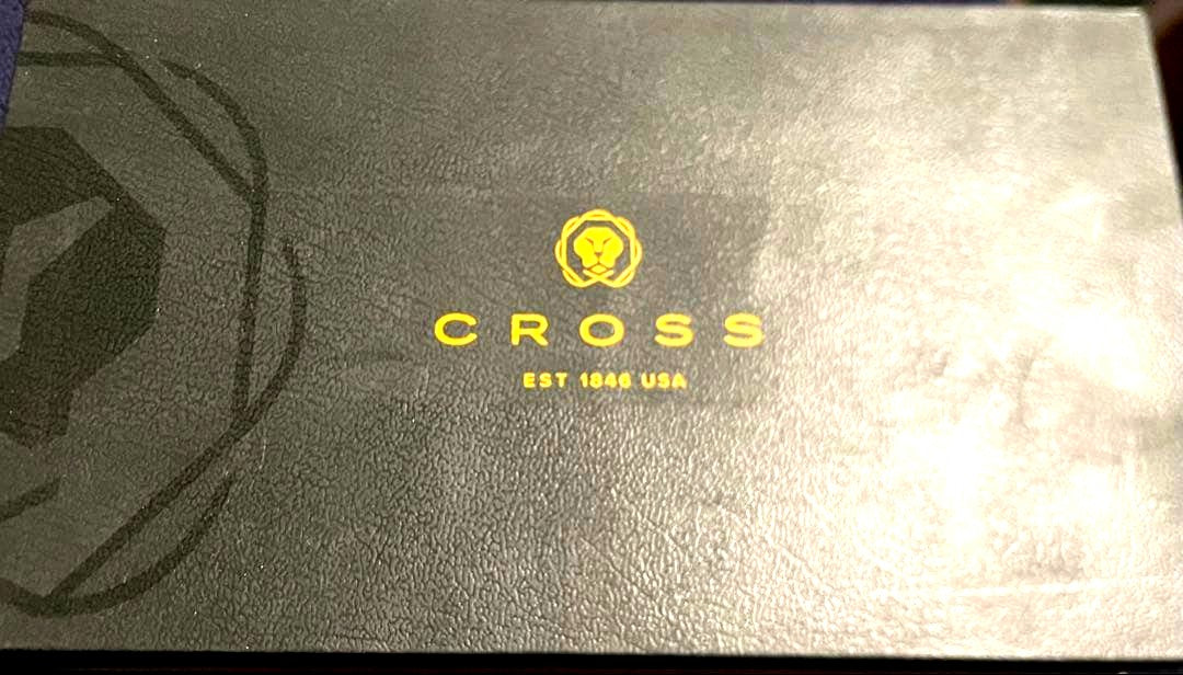 CROSS ballpoint pen in black with silver accents shown with box and protective case