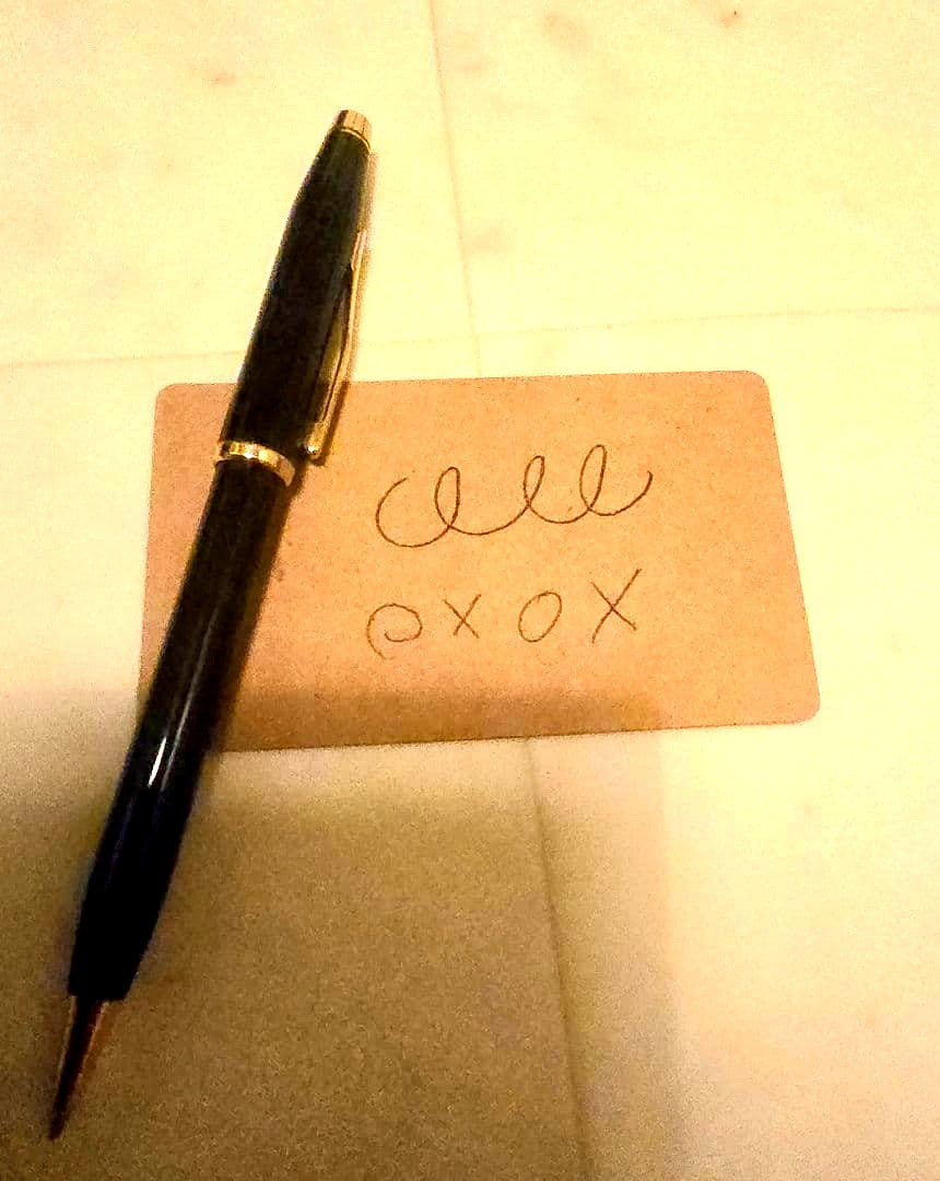 Cross ballpoint pen with black body and gold trim classic century design