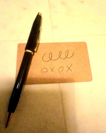 Cross ballpoint pen with black body and gold trim classic century design