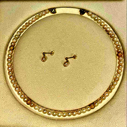 Akoya pearl necklace and matching earrings set with 5.5-6mm pearls and 40cm necklace length on white background