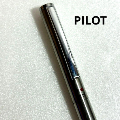 Discontinued Pilot Twist ballpoint pen in silver with two color ink mechanism, used condition