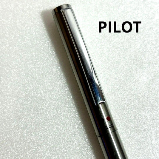 Discontinued Pilot Twist ballpoint pen in silver with two color ink mechanism, used condition
