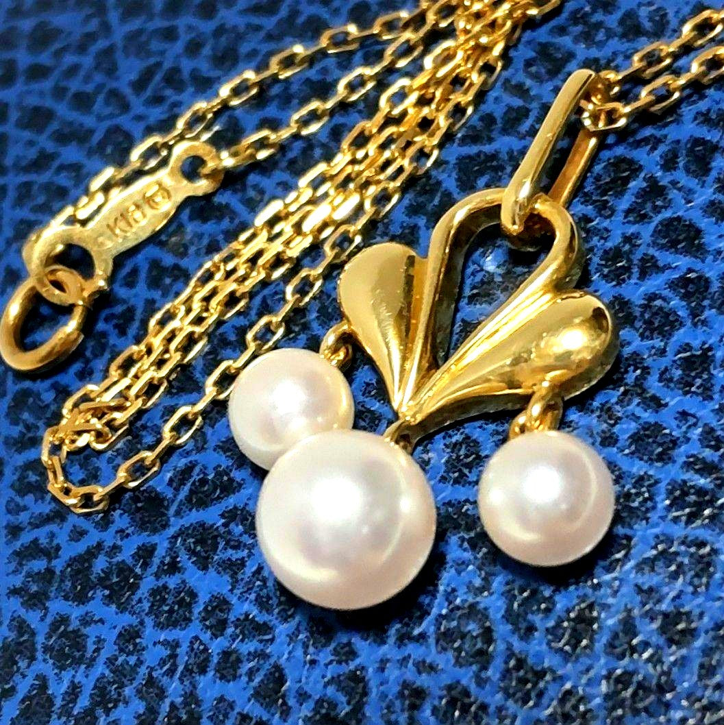MIKIMOTO Akoya pearl necklace featuring 5-6.2mm pearls with a 25x15mm moving pearl pendant on a 40cm chain