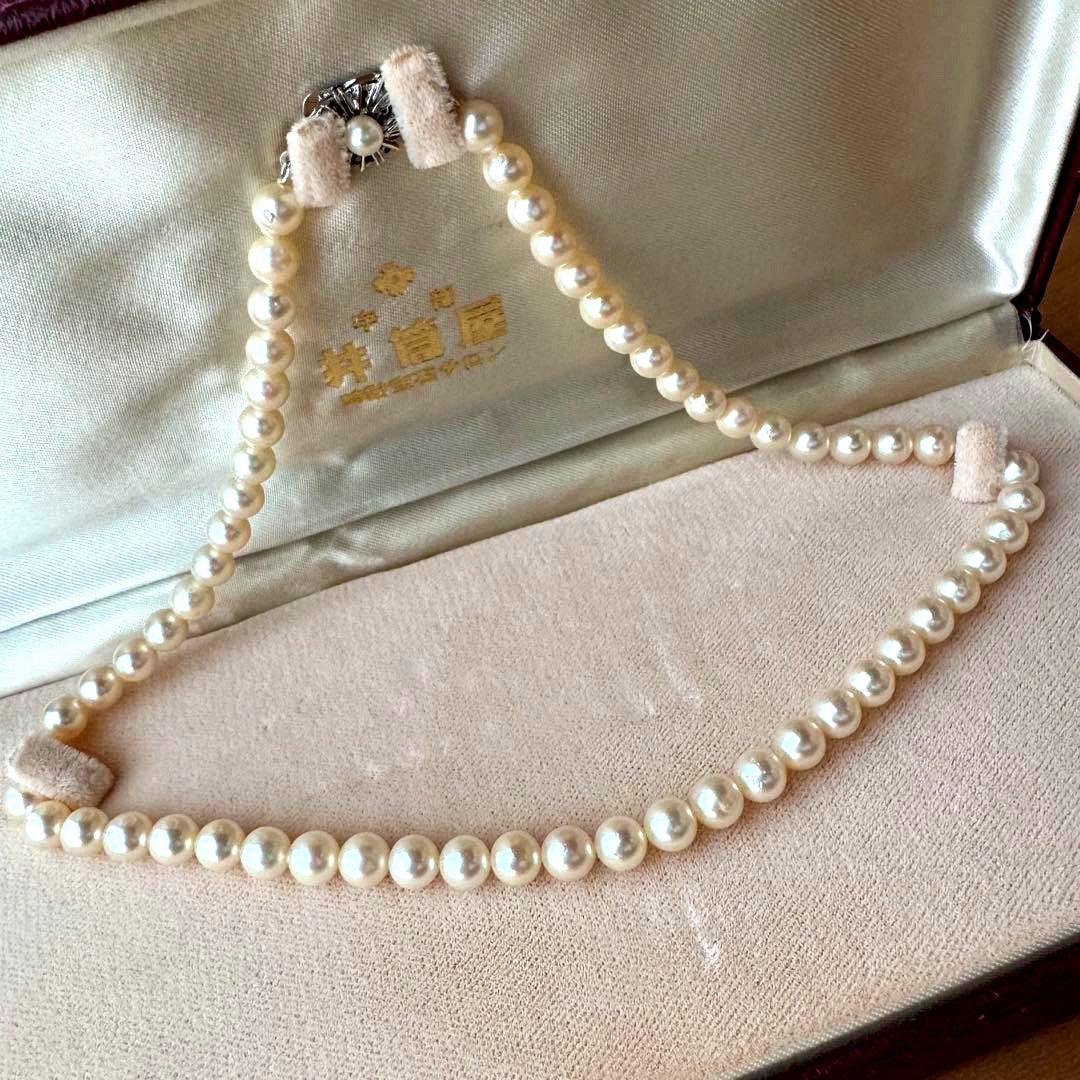 Small pearl necklace featuring 60 round Akoya pearls sized 6.8mm on a 42cm strand