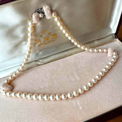 Small pearl necklace featuring 60 round Akoya pearls sized 6.8mm on a 42cm strand