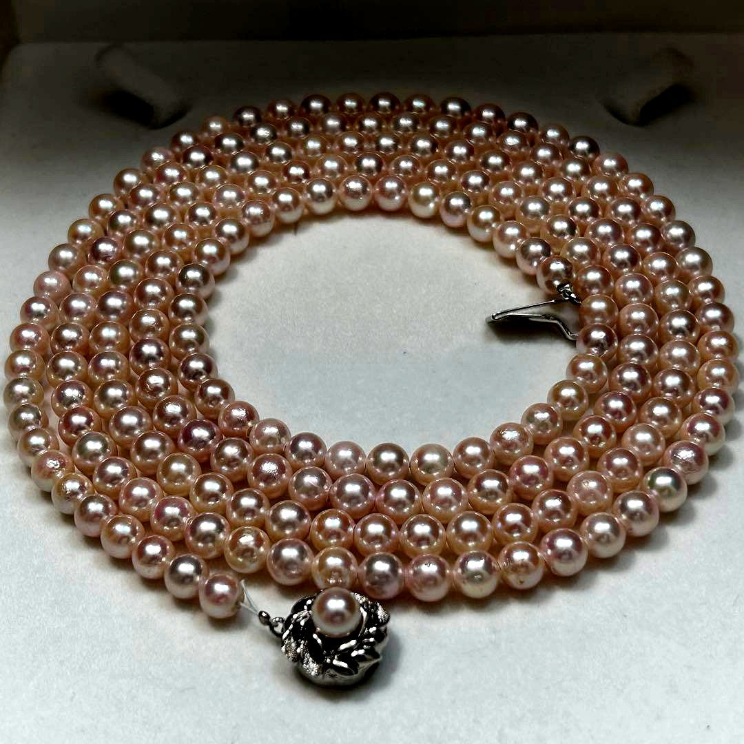 Long Akoya pearl necklace with 6.5mm pink pearls measuring 124cm with sterling silver details