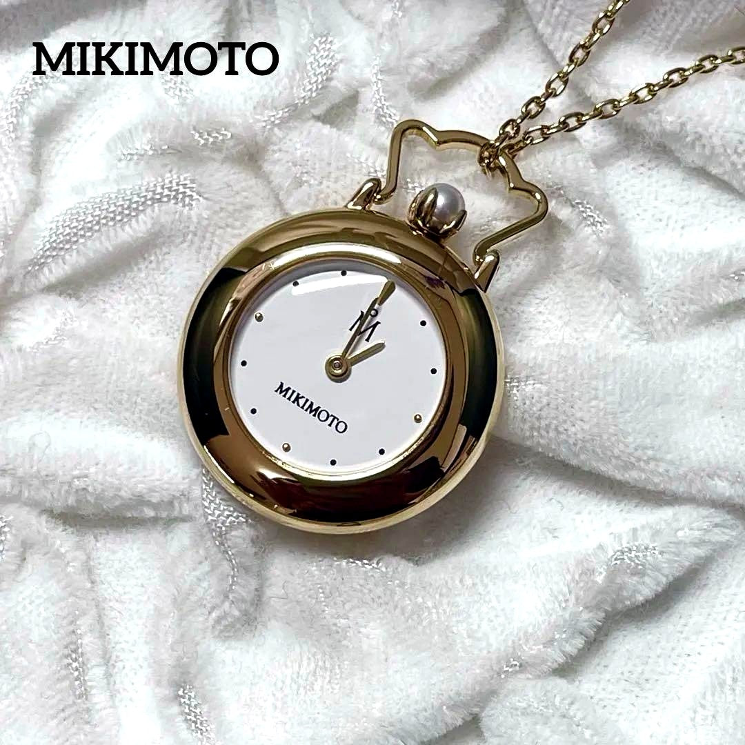 Mikimoto pendant watch with 4mm pearl and 2.5cm clock on a 70cm chain with clock stand