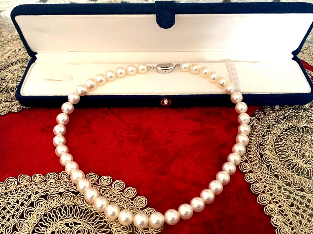 Akoya pearl necklace with 43 round 9mm pearls on a 41cm strand with push-in clasp