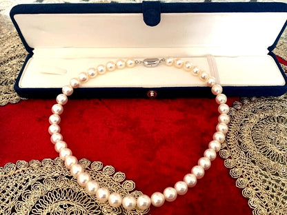 Akoya pearl necklace with 43 round 9mm pearls on a 41cm strand with push-in clasp
