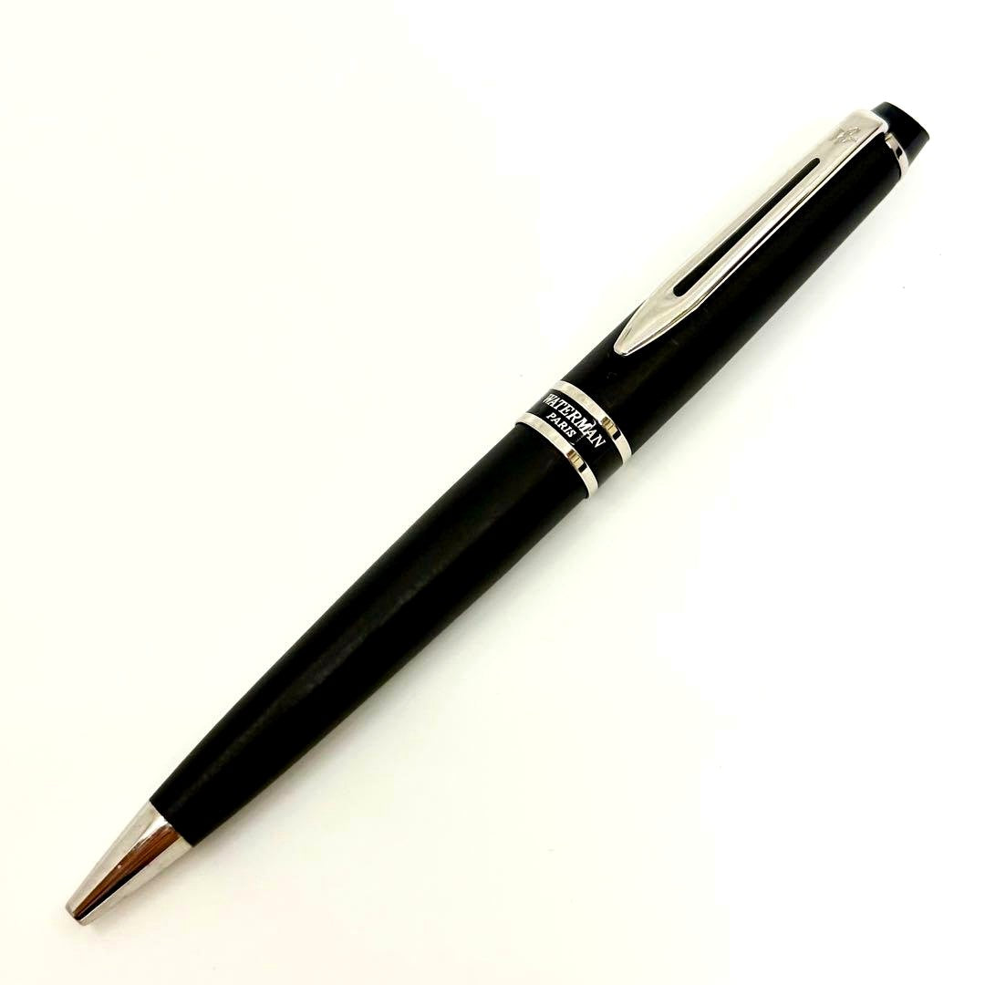 Waterman Expert ballpoint pen in matte black with silver trim shown from side angle