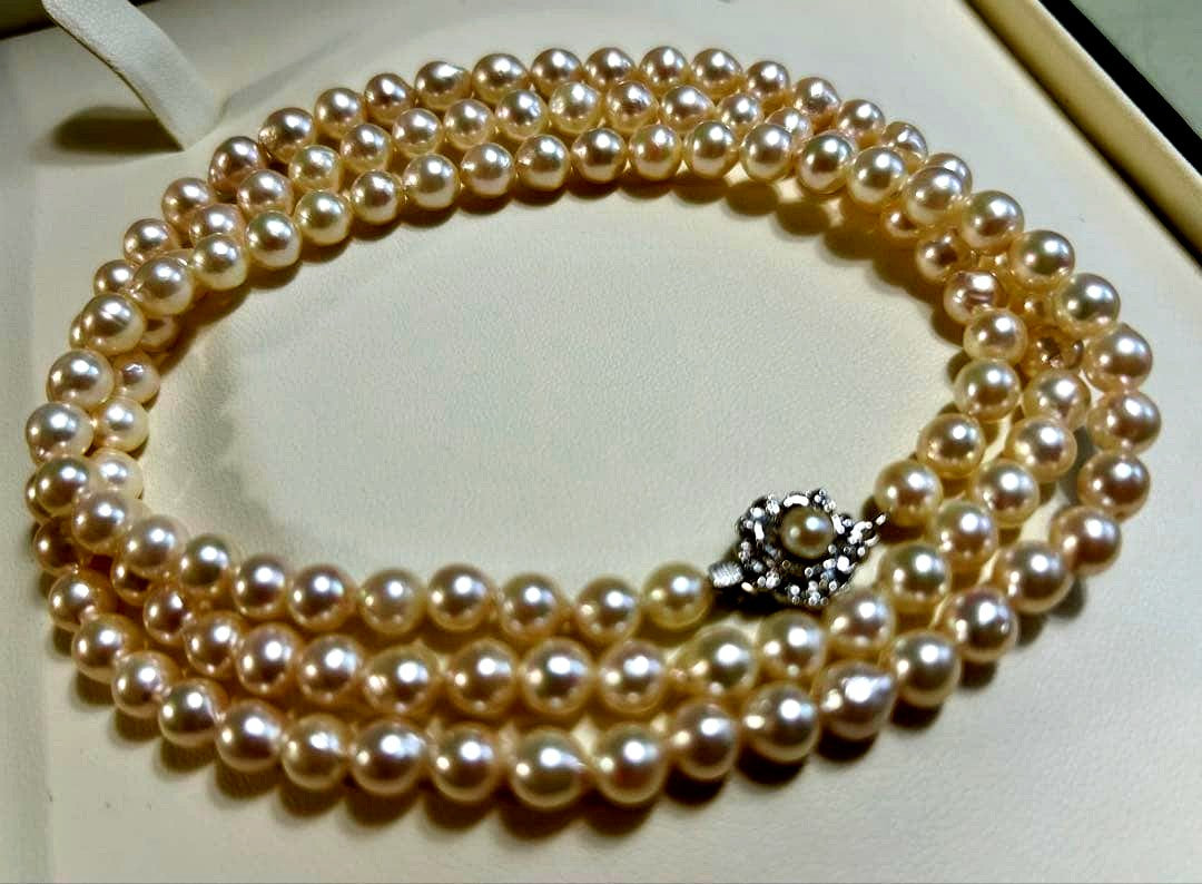 Akoya pearl long necklace with 5-5.5mm pearls and silver clasp measuring about 80cm
