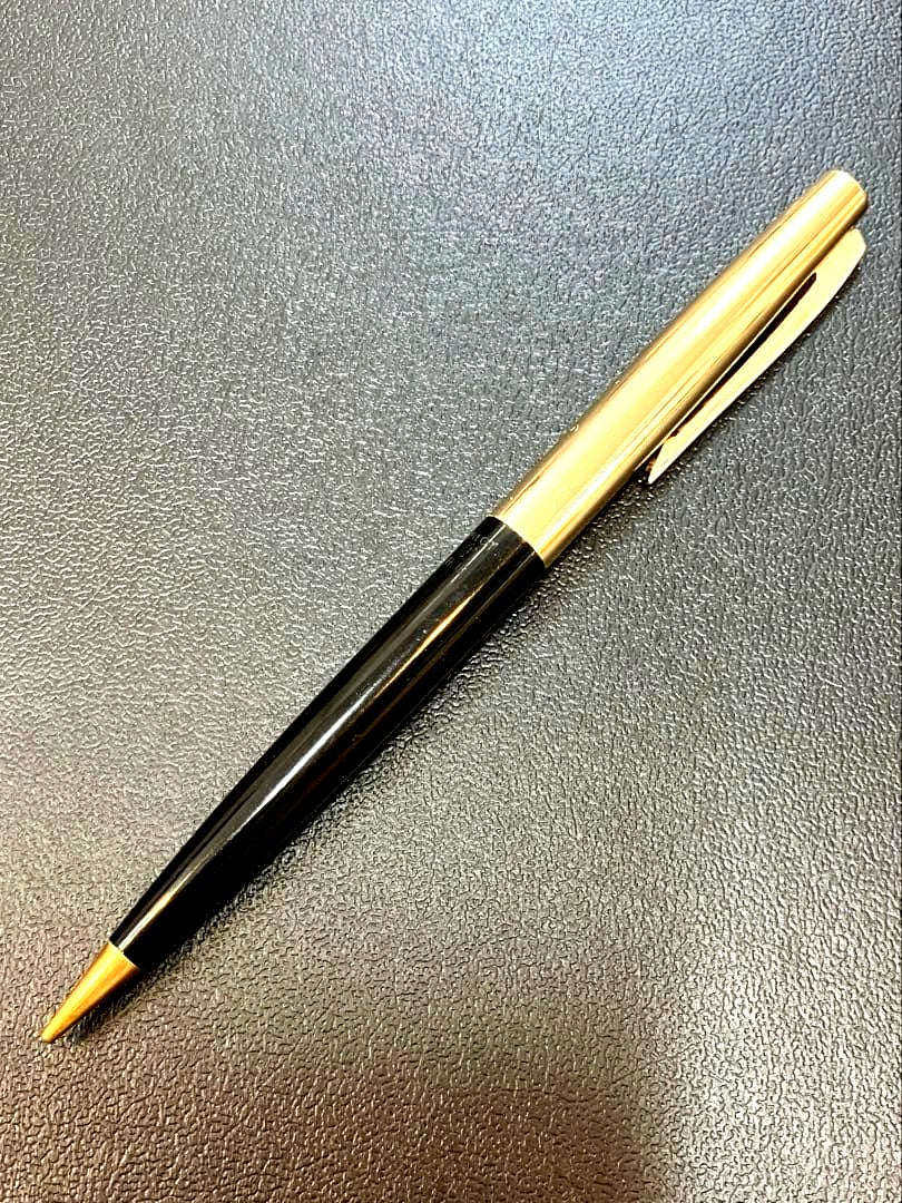 Pilot mechanical pencil in black and gold metal showing barrel and tip