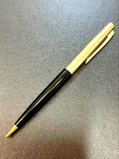 Pilot mechanical pencil in black and gold metal showing barrel and tip