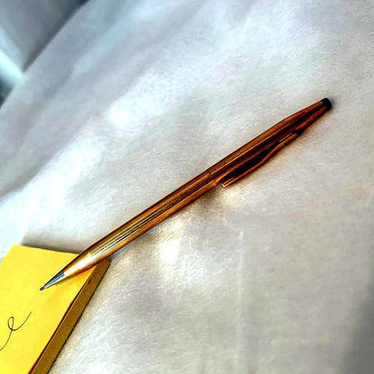 Cross Fine Point Mechanical Pencil in gold metal, approximately 5.1 inches long with minor scratches