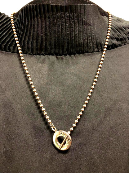Agette 925 silver ball chain necklace paired with vintage Figaro chain on white background