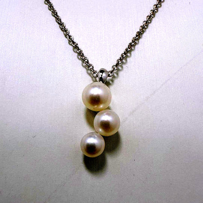 Tasaki silver necklace featuring linked three pearls with an adjustable 38-42 cm chain
