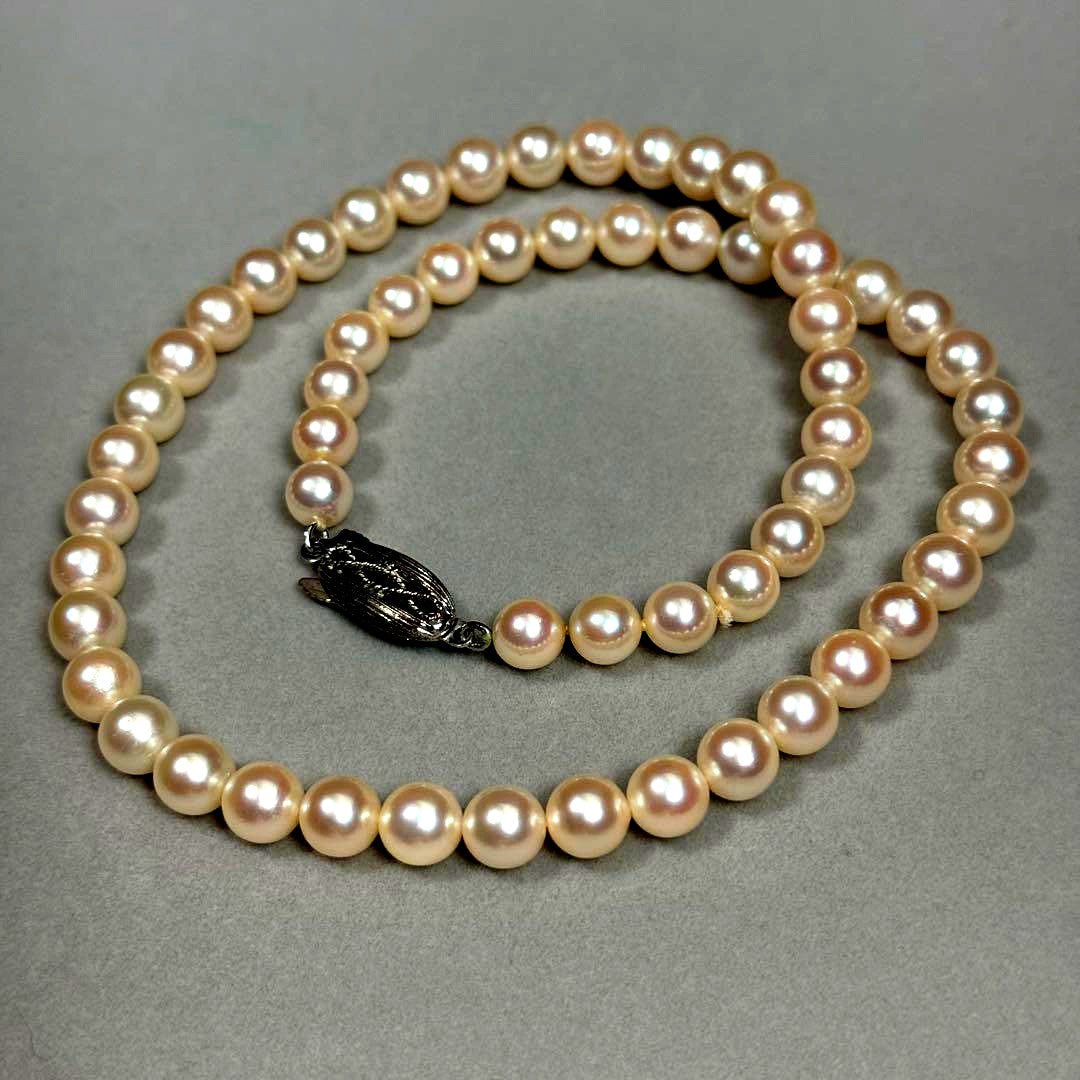 Akoya pearl necklace with 6.5-7mm white pearls on a silver chain about 43cm long