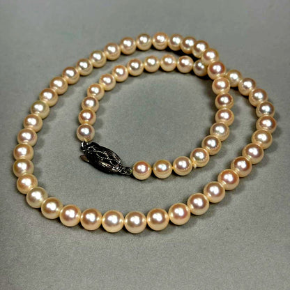 Akoya pearl necklace with 6.5-7mm white pearls on a silver chain about 43cm long