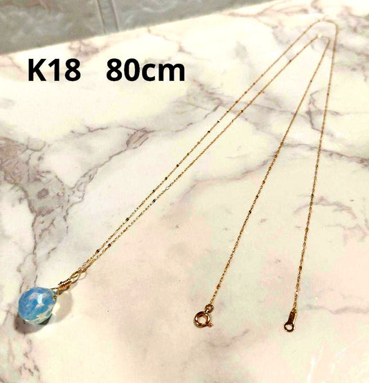 18 karat gold necklace 80cm long with a top clasp on a white background