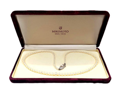 Mikimoto Akoya pearl gradient necklace with pearls ranging 3 to 7 mm displayed with velour case