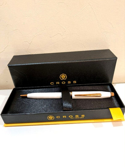 Cross Century II pearl white ballpoint pen with gold accents displayed with box and instructions